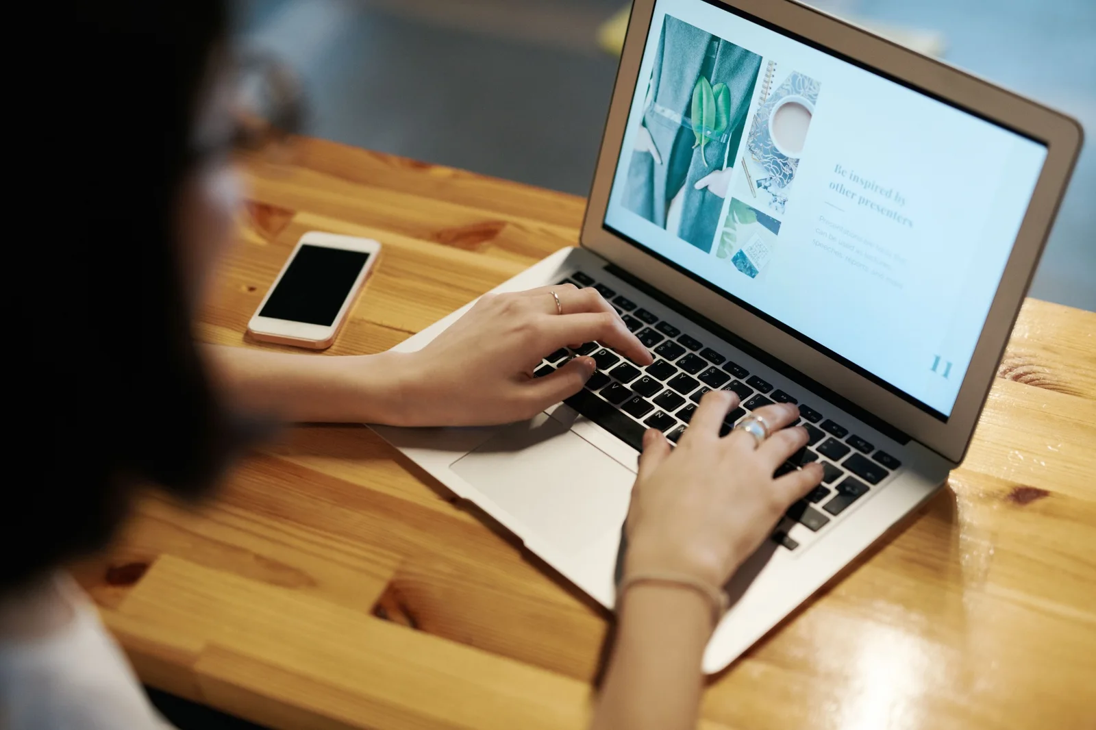 A person exploring a website on a laptop